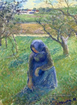 cueillir des herbes 1882 Camille Pissarro Peinture à l'huile